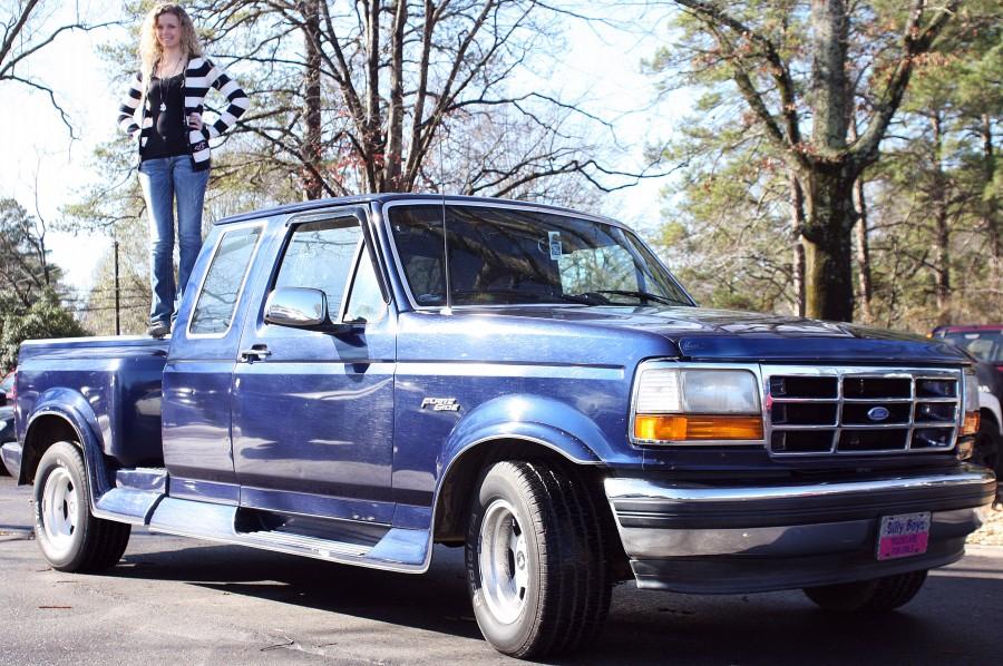Senior Emileigh Heathscott and her 1994 Ford F-150 CAITLIN GREEN PHOTO