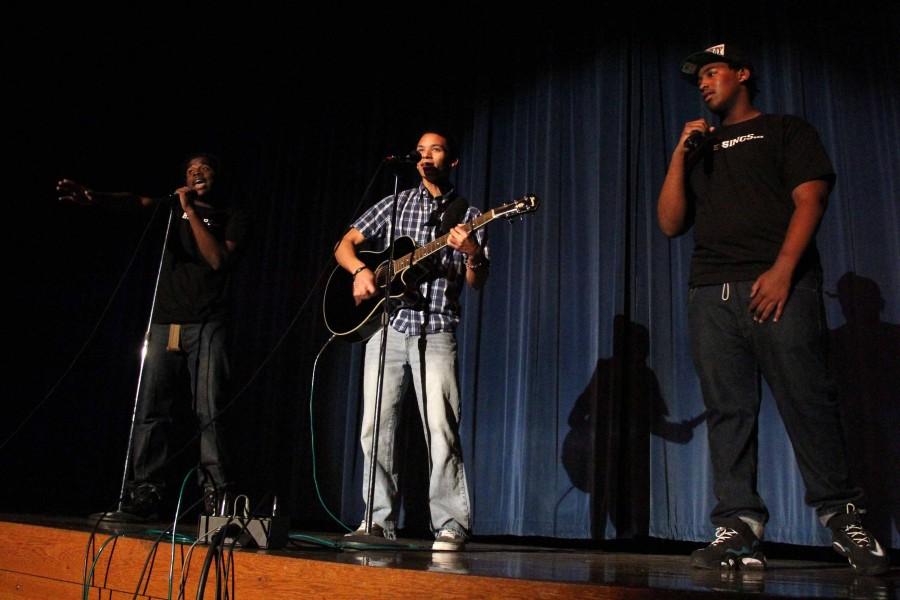 Junior Kordell Boykins, senior Caleb Thomas and junior Jonathan Bryant sing an original song. CHARLIE HUNNICUTT PHOTO
