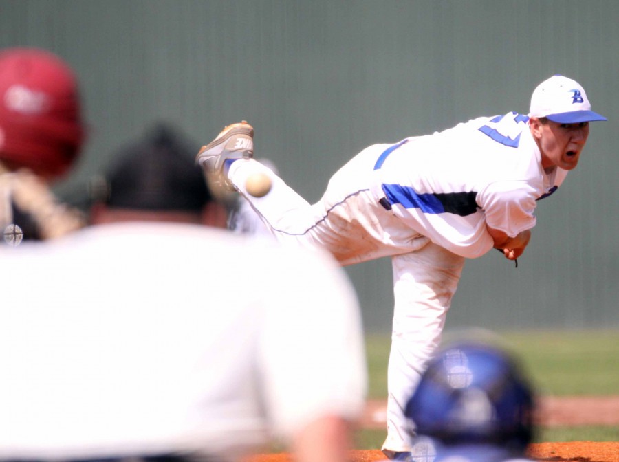 Junior Nate Rutherford pitches in a non-conference win over Texarkana Saturday, March 31.