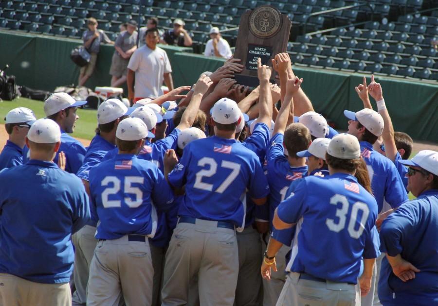 The baseball team hoists up its second state championship trophy of the past three years. CALLIE AKERS PHOTO