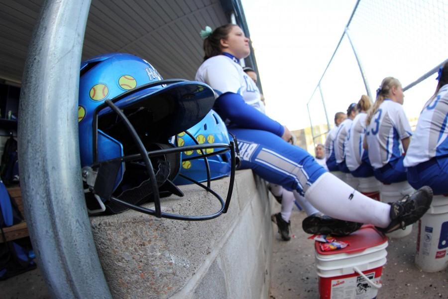 Sophomore Sydney Gogus watches from the dugout as the team plays against North Little Rock April 8 | bethany pilcher photo 