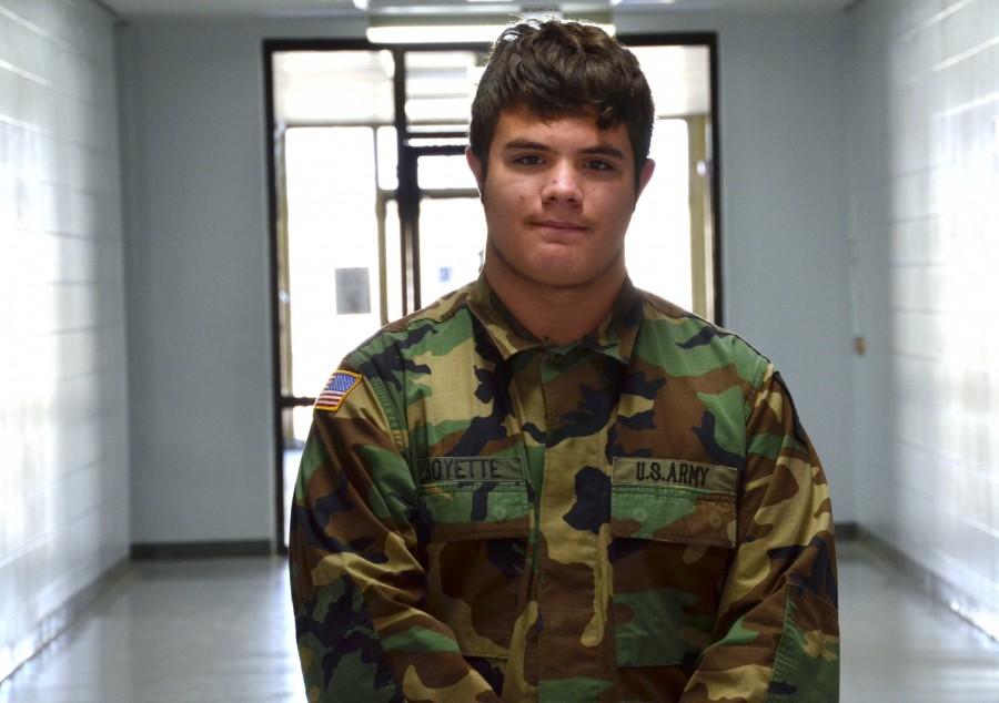 Junior Tommy Leath shows off his ROTC uniform before heading to construction. | photo madeline colclasure