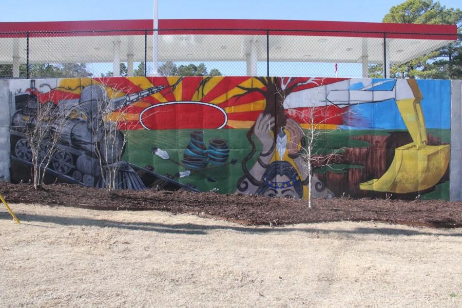 The colorful Kum & Go mural depicts Saline Countys diverse history. | photo Paige Staggs