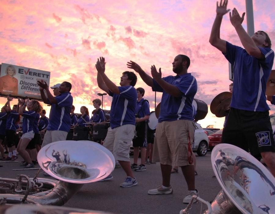 Band members rejoice after a performance | photo Brooke Lasley