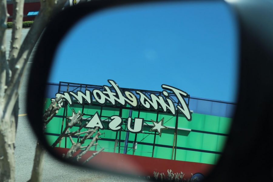 Tinseltown from the view of a side mirror.