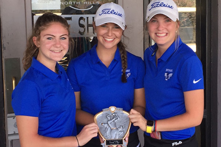 From the left Freshman Caitlin LaCerra, Junior Meredith Medford and Junior Brooklyn Waller pose with their second place trophy at the North Little Rock Invitational