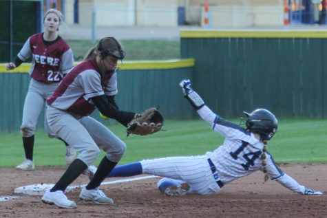 At the game against Beebe March 2, junior Caitlin LaCerra steals third base. LaCerra is leading the team in stolen bases this season. Stealing bases has a lot to do with being able to read the defense to see when the next base is open, LaCerra said.
