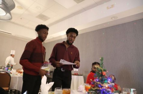 Senior Isaiah Kearney helps his former church members for a special event. 