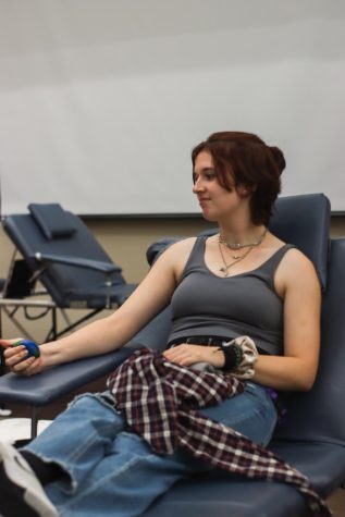 Junior Kristen Reese donates blood. 