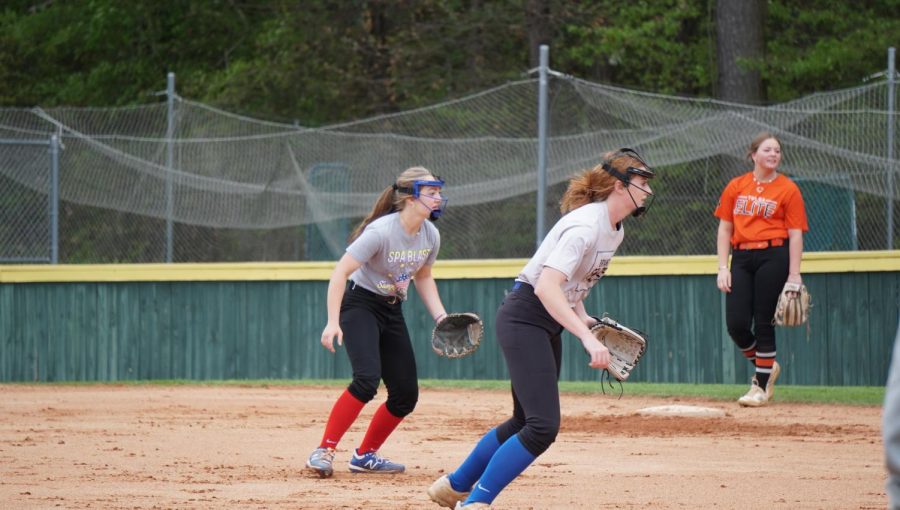 Senior Emily Miller and Sophomore Rachel Havens practice catching on Thursday, April 6.