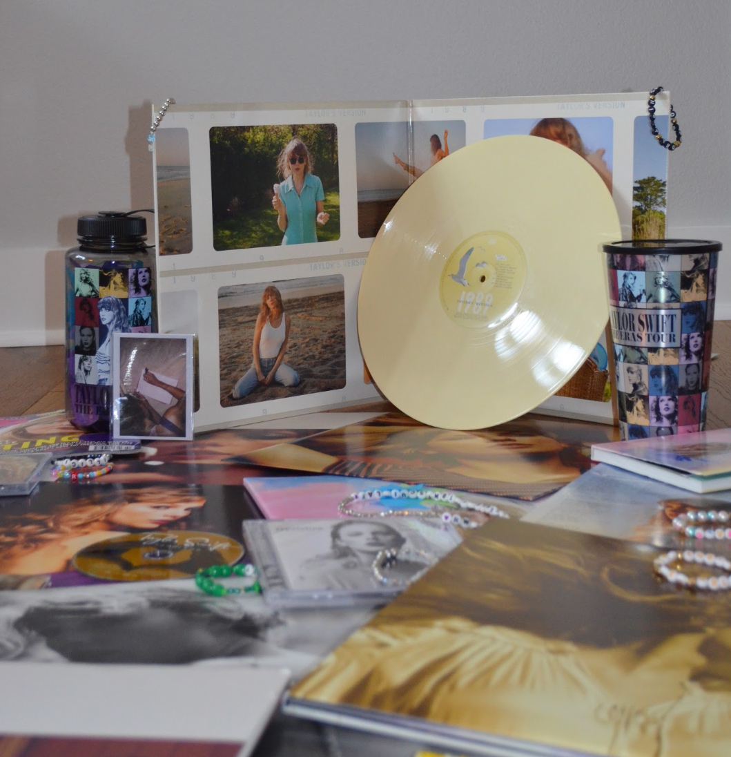 1989 (Taylor’s Version) vinyl with other Taylor Swift items.