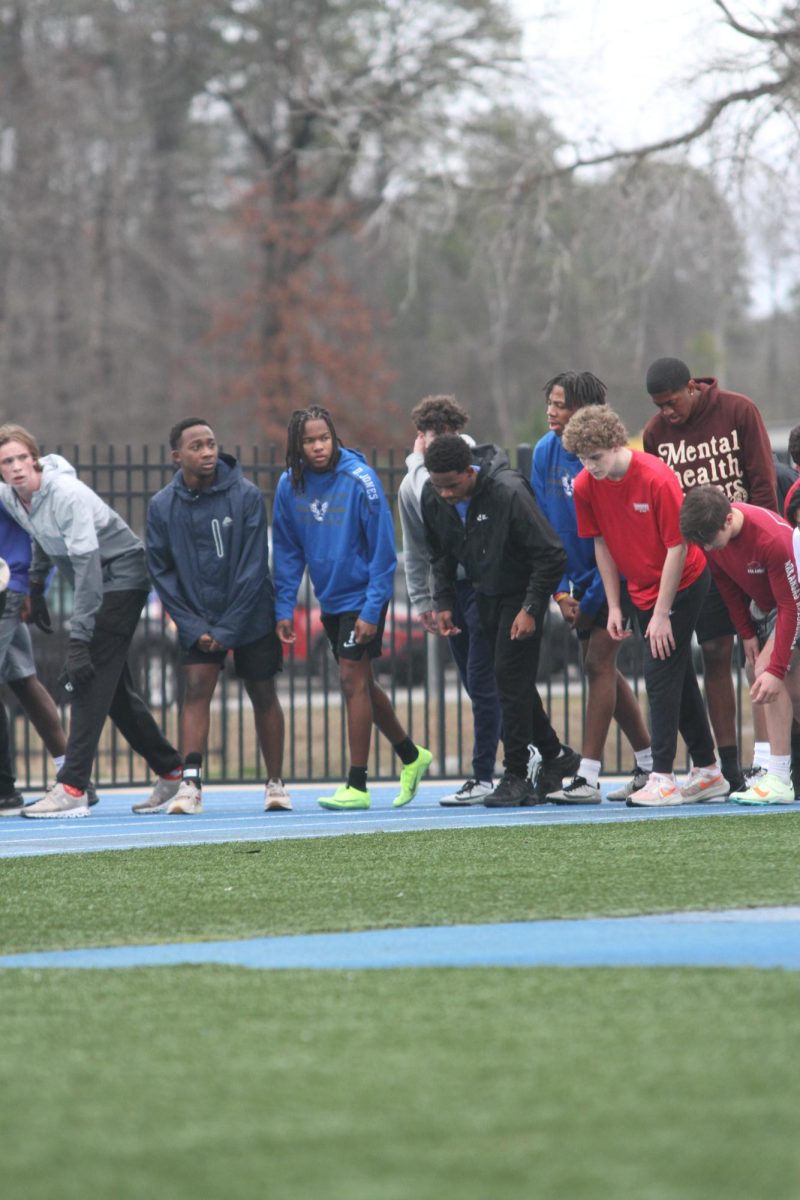 The Hornet track team prepares for their next sprint to complete their workout.