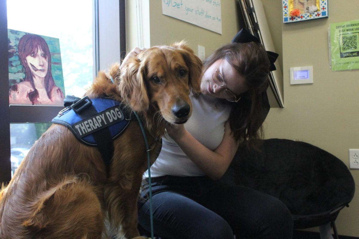 On Wednesday, Sept. 18, Bryant's therapy dog, Archie, visited the high school. During fourth period, Emily Carden went to sit next to him