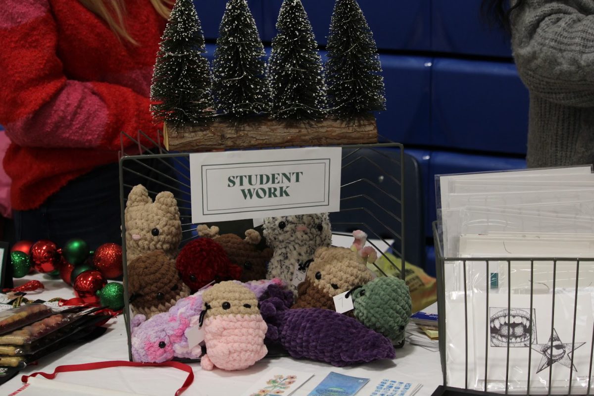 Teyha Hinkson, an art teacher at Bryant, sold her own art, Christmas cards, hand-painted ornaments and some of her students’ work: crocheted animals and bookmark prints. 