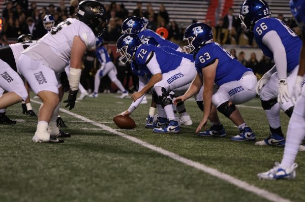 Offensive lineman Mason Patterson (72) sets the ball for the first play of the game on War Memorial’s Simmons Bank Field at 6:30 p.m. 