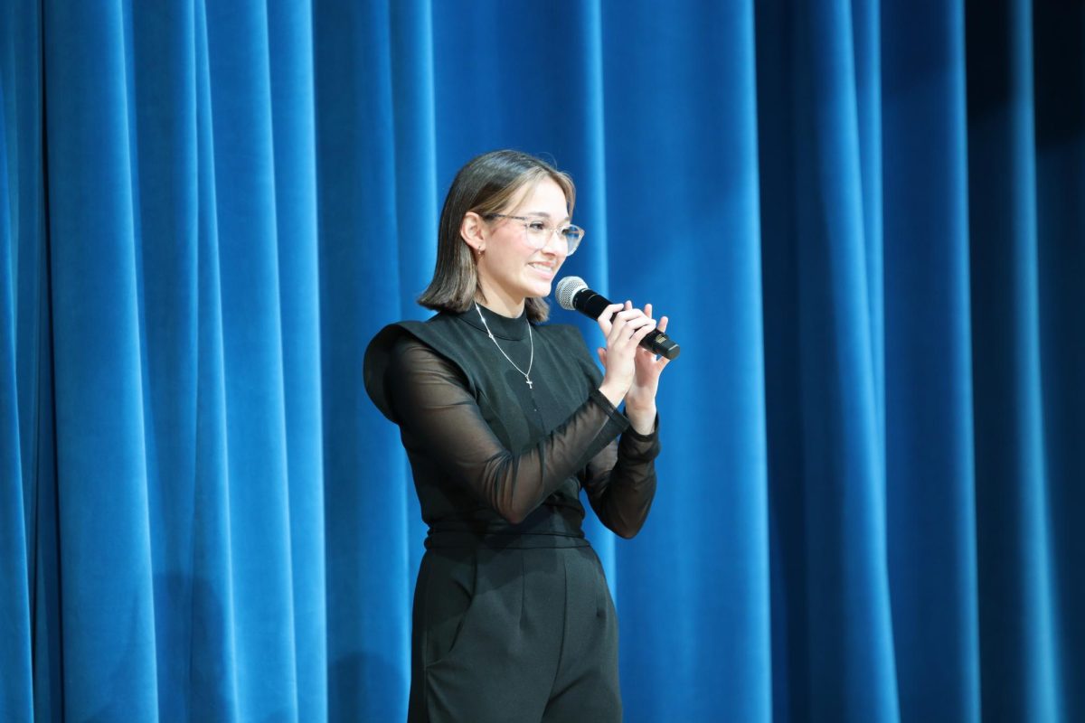 Ayla Paredes, 10, sings at the annual Coffeehouse Cabaret to raise money for the All State fees.