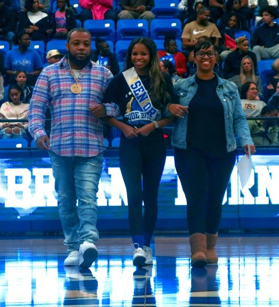 Senior Aaniyah Taylor was escorted by Tommy Taylor and Alliesha Rand for Senior Night on Feb. 24. Aaniyah has plans to enlist in the Air Force and study cosmetology.

