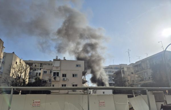 Smoking residential building in Tel Aviv minutes after being struck by an Iranian missile.